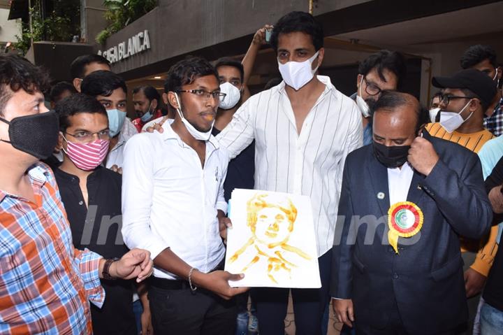 Sonu Sood greets his fans as they gather to celebrate his birthday