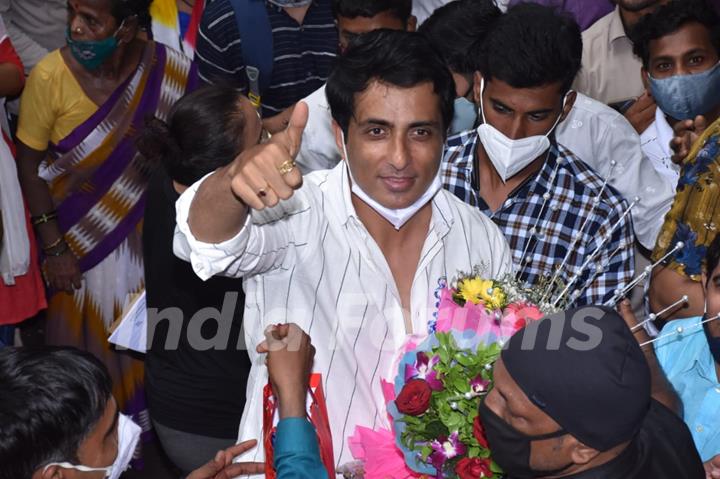 Sonu Sood greets his fans as they gather to celebrate his birthday