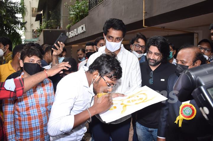 Sonu Sood greets his fans as they gather to celebrate his birthday