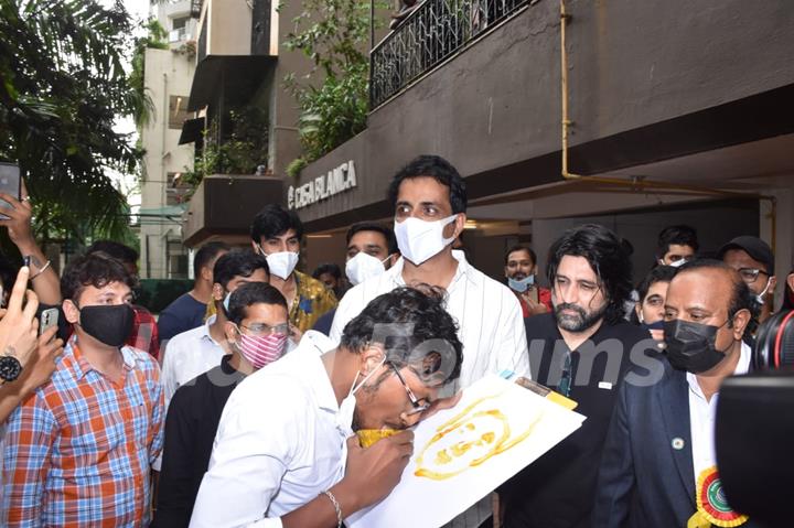 Sonu Sood greets his fans as they gather to celebrate his birthday