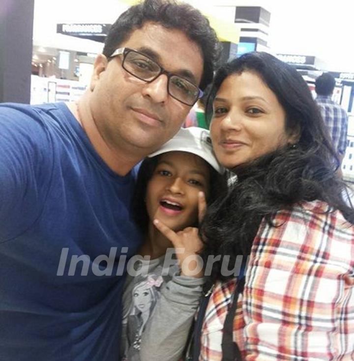 Anup Upadhyay with his wife and daughter