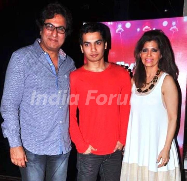 Talat Aziz with his wife and son