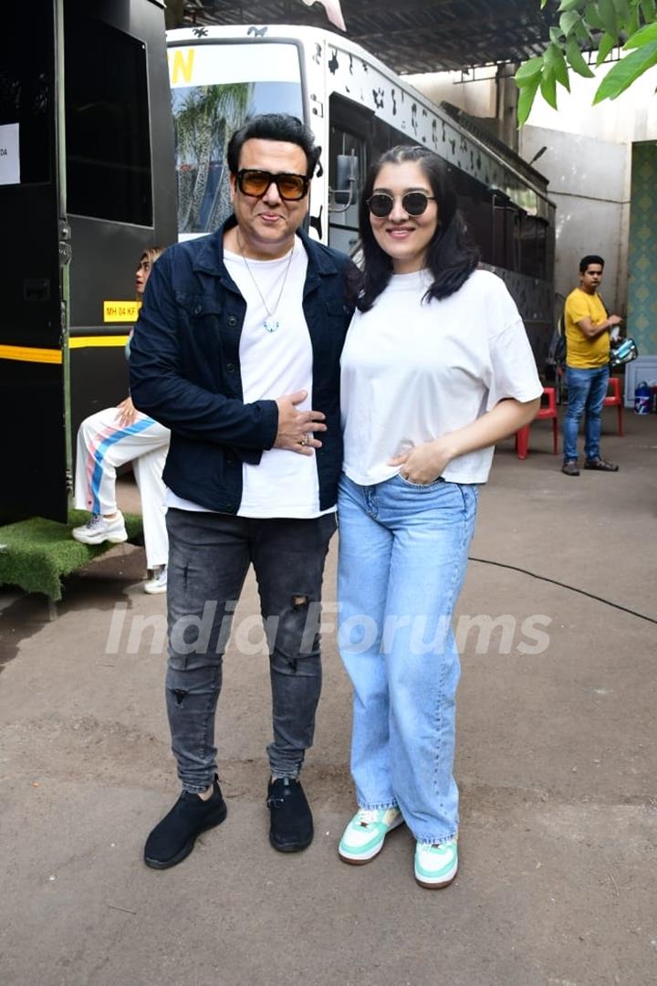 Govinda poses with Tina Ahuja outside the sets of Superstar Singer 2