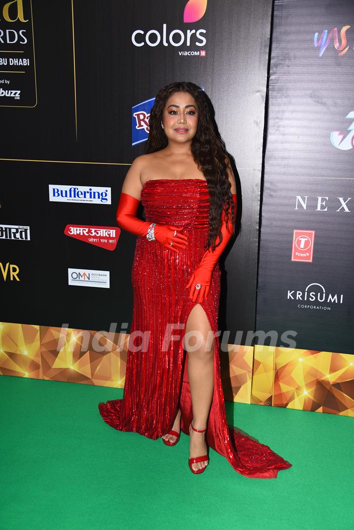 Neha Kakkar poses on the green carpet of IIFA awards 2022