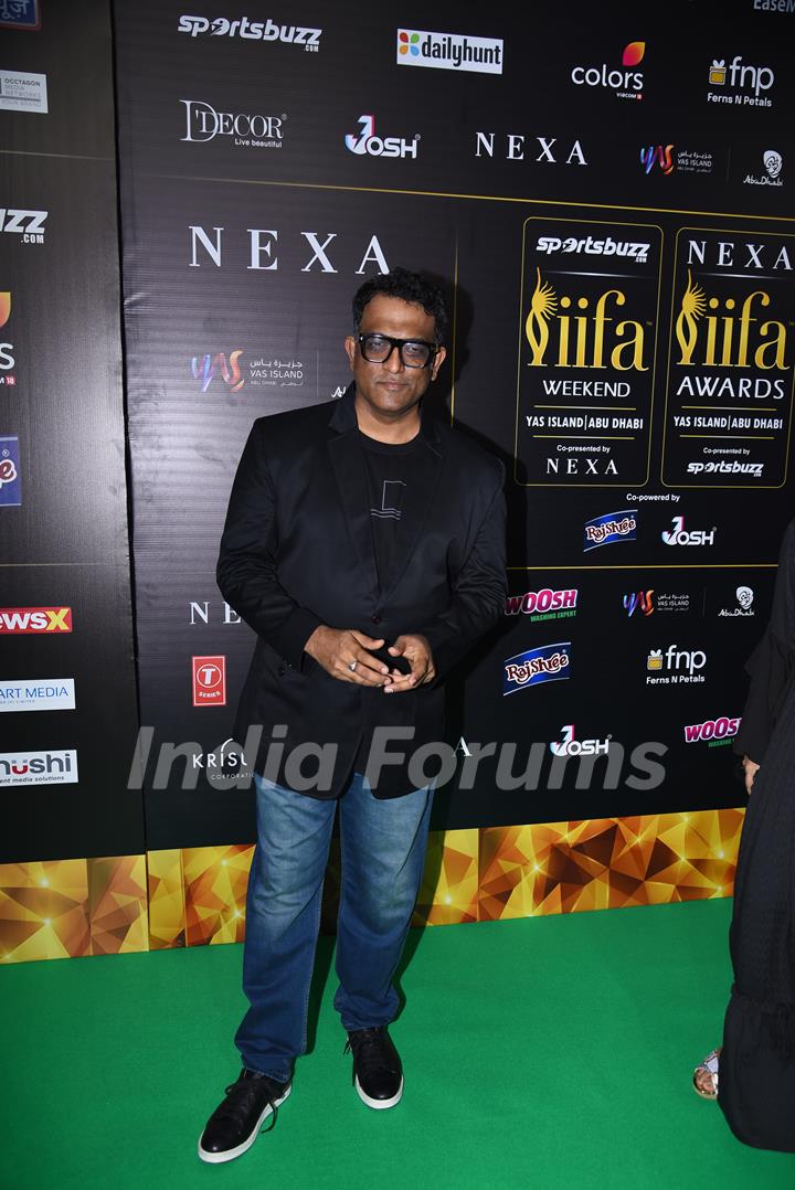 Anurag Basu poses on the green carpet of IIFA awards 2022