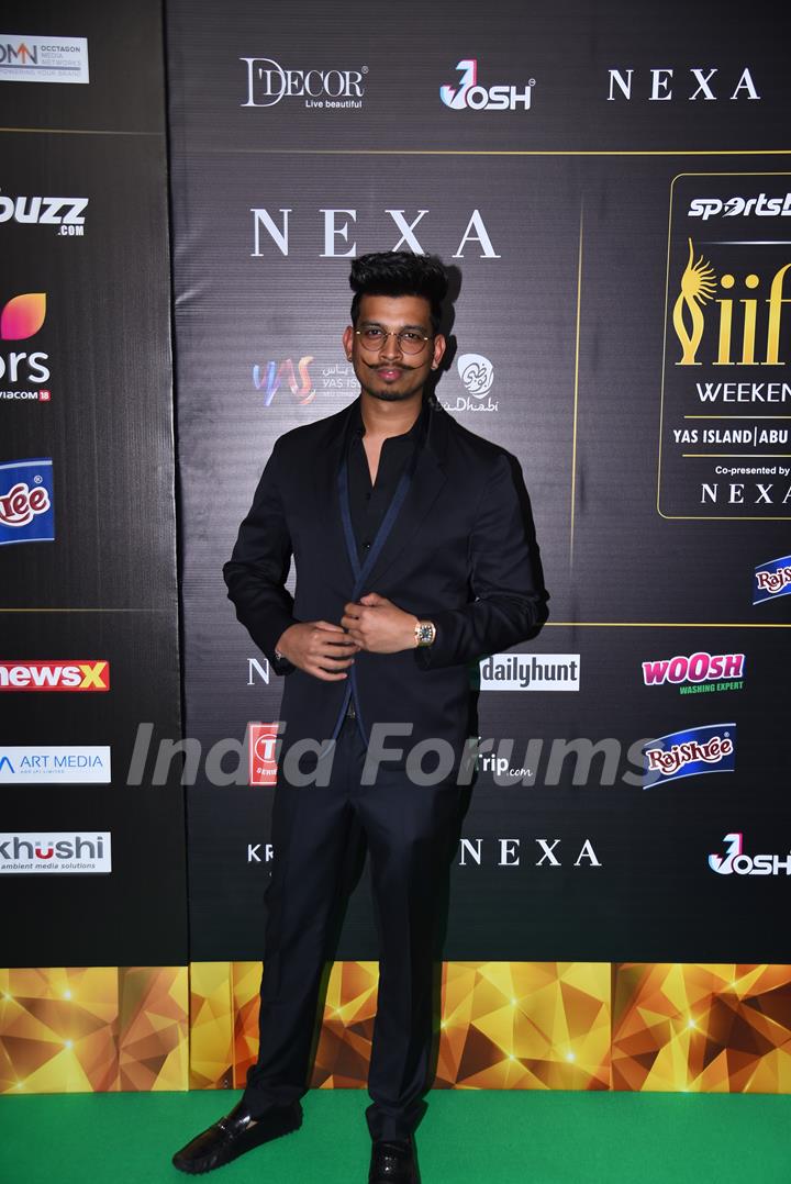 Anshul Garg  poses on the green carpet of IIFA awards 2022 