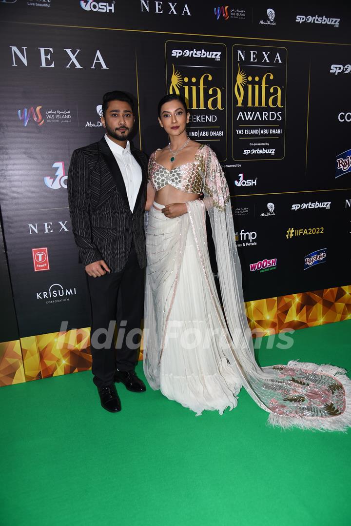 Zaid Darbar and Gauahar Khan poses on the green carpet of IIFA awards 2022 