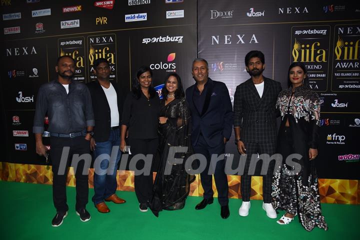 Celebrities poses on the green carpet of IIFA awards 2022 