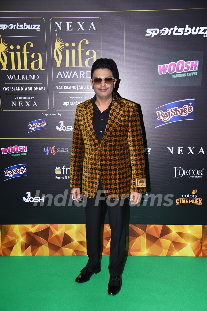 Bhushan Kumar poses to paparazzi at green carpet of IIFA awards 2022 in Abu Dhabi