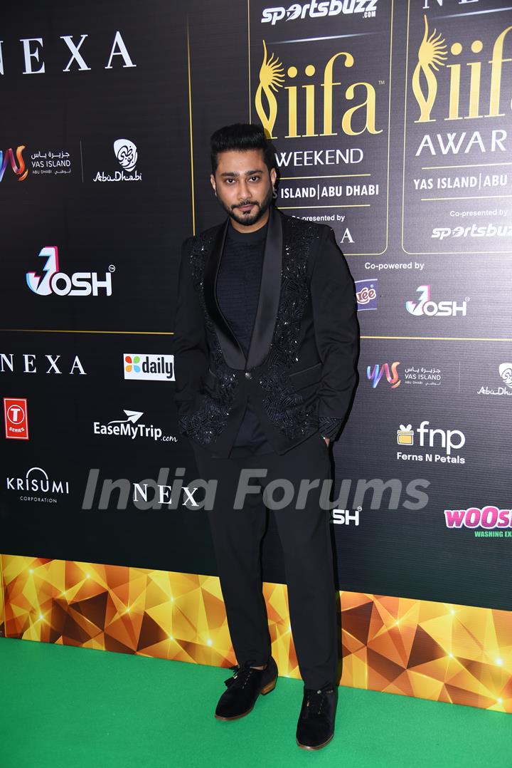 Zaid Darbar poses to paparazzi at green carpet of IIFA awards 2022 in Abu Dhabi