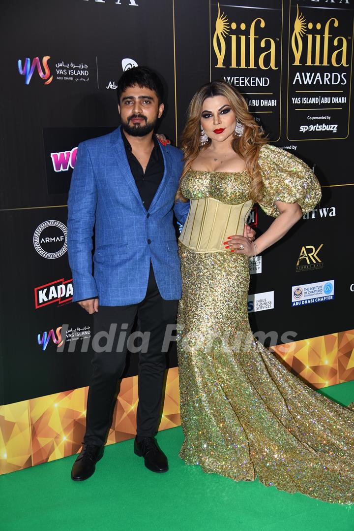 Rakhi Sawant and her boyfriend Adil Khan poses to paparazzi at green carpet of IIFA awards 2022 in Abu Dhabi