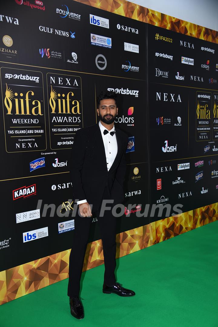 Vicky Kaushal poses to paparazzi at green carpet of IIFA awards 2022 in Abu Dhabi