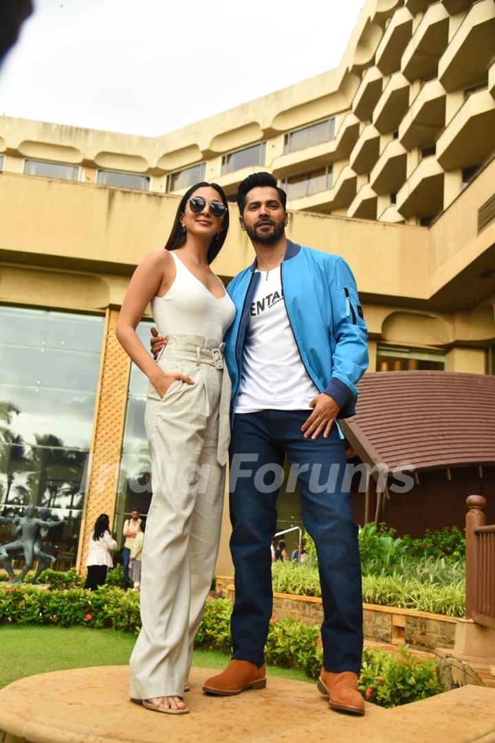 Varun Dhawan poses with Kiara Advani to paparazzi spotted promoting their upcoming film JugJugg Jeeyo in the city 