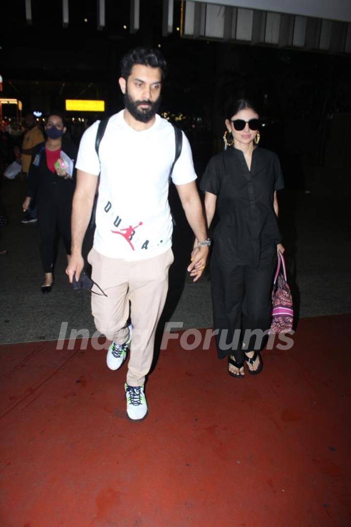 Mouni Roy and Suraj Nambiar spotted at Mumbai airport