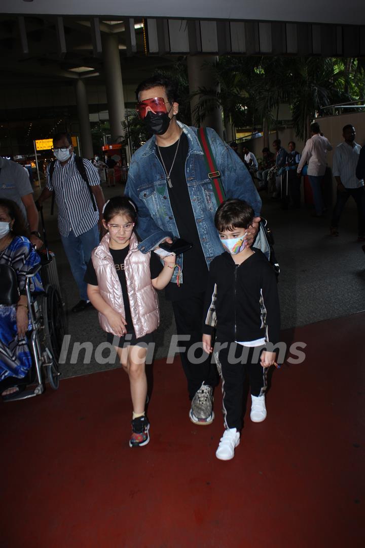 Karan Johar spotted with his kids at the Mumbai airport