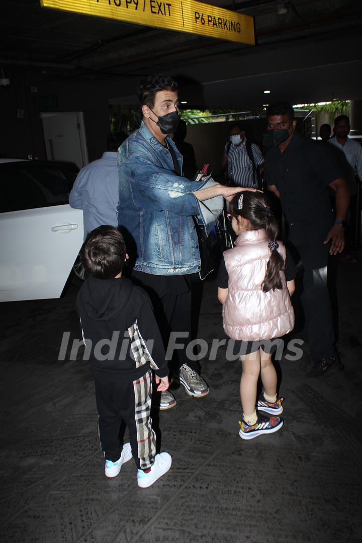 Karan Johar spotted with his kids at the Mumbai airport