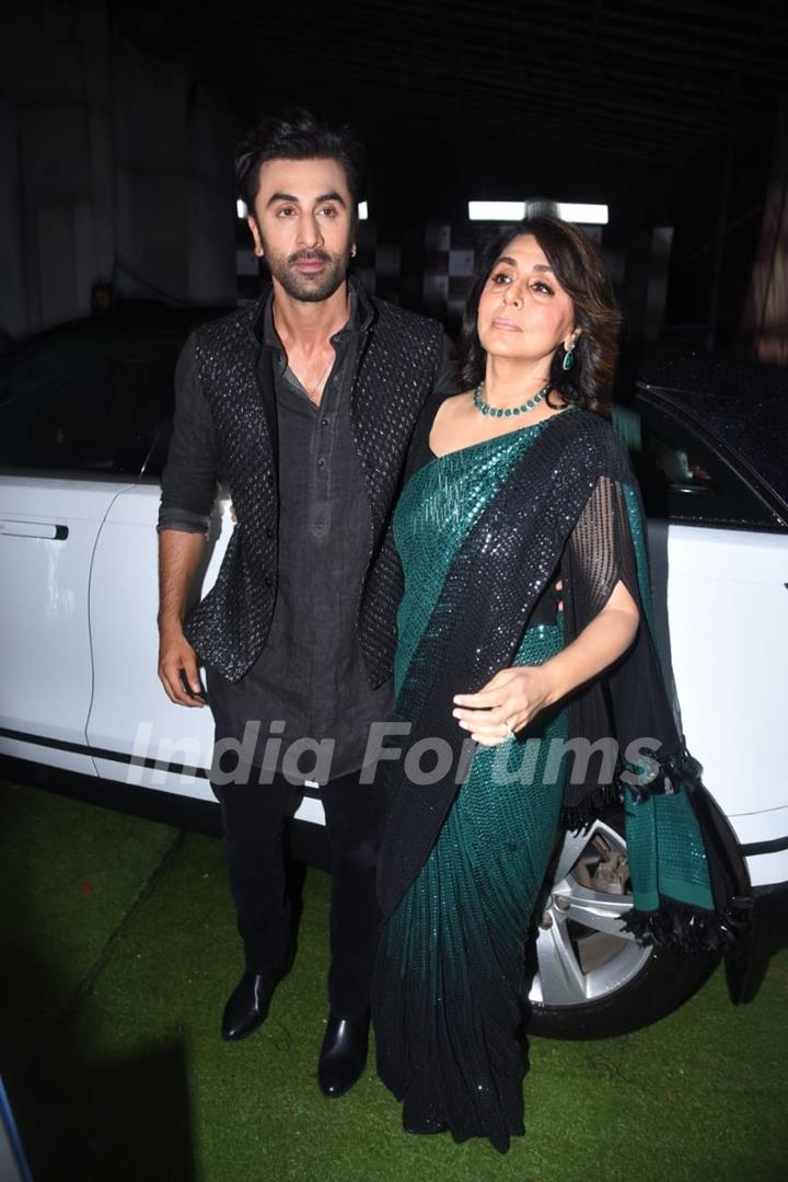 Ranbir Kapoor poses with Neetu Kapoor clicked on the set of Dance Deewane Juniors for promoting Shamshera 