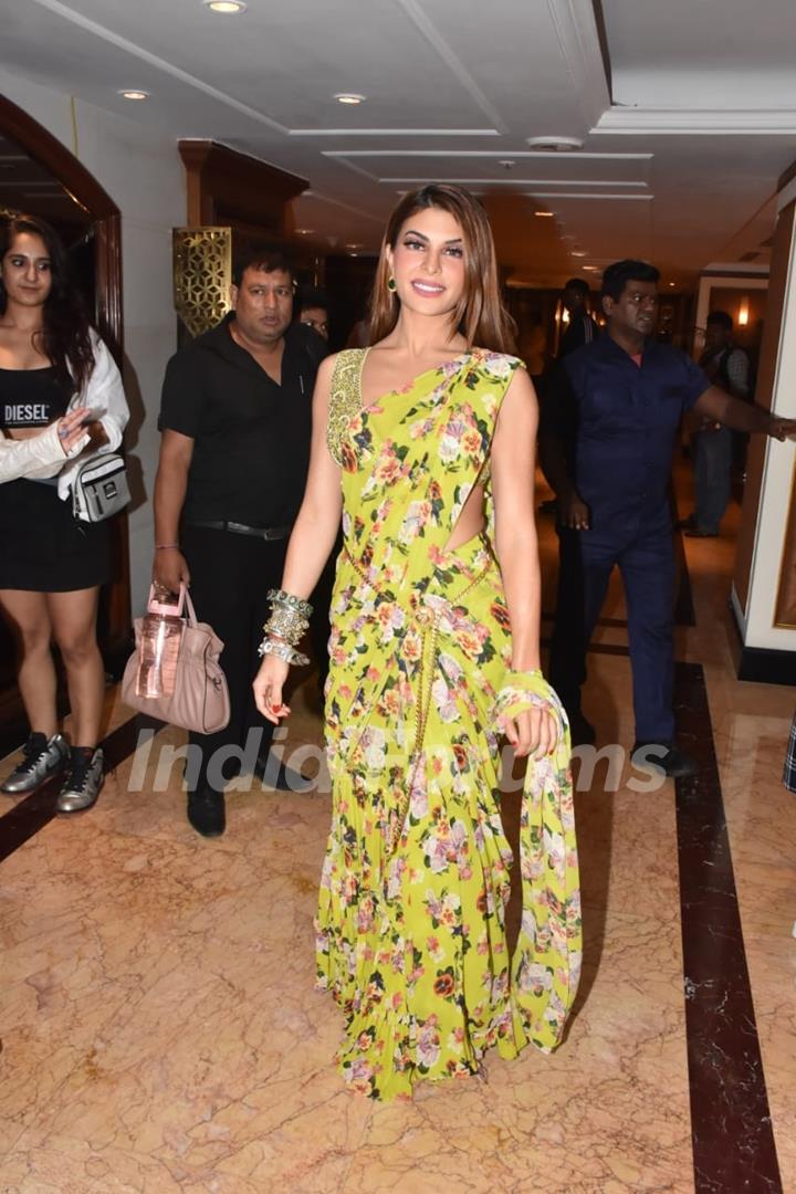 Jacqueline Fernandez was a sight to the sore eyes in a floral yellow saree at the press conference of Vikrant Rona