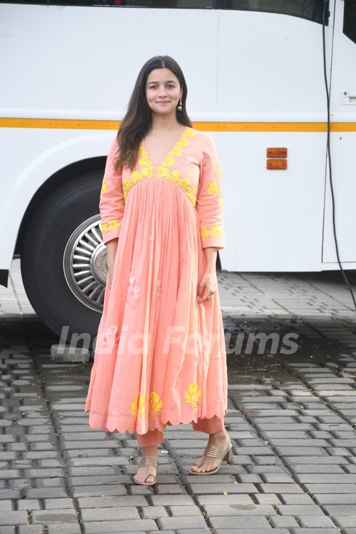 Mum-to-be Alia Bhatt looked radiant in an orange and yellow ethnic wear as she was clicked at the airport