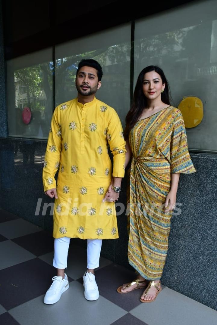 Zaid Darbar and Gauahar Khan twinned in yellow as they were spotted today. While Gauahar opted for a yellow wrap around, kaftan dress, Zaid wore a yellow kurta and white pants