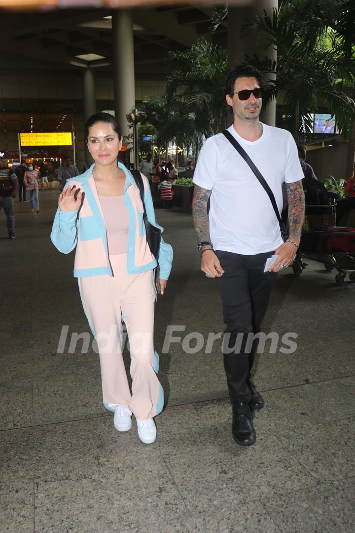 Sunny Leone spotted with husband Daniel Weber at the Mumbai airport