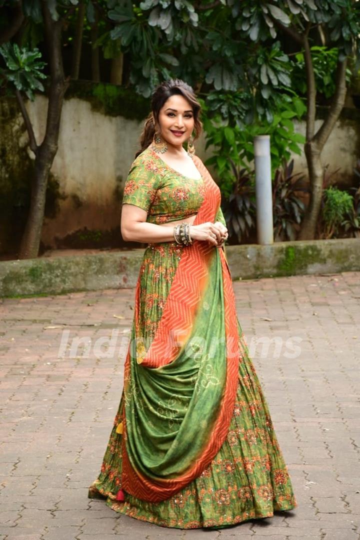 Madhuri Dixit snapped on the set of Jhalak Dikhhla Jaa 10 in an orange and green lehenga