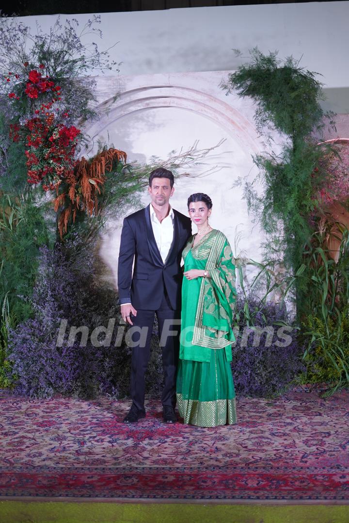 Hrithik Roshan looked handsome in a black suit with girlfriend Saba Azad in a green sharara set at Ali and Richa's wedding reception