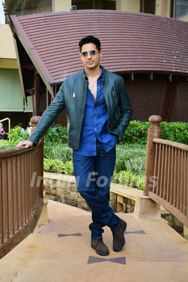 Sidharth Malhotra is a handsome hunk in a blue denim shirt and leather jacket