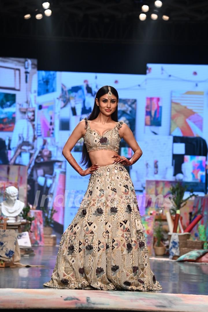 Mouni Roy made heads turn in an embroidered lehenga choli at the Lakme Fashion Week