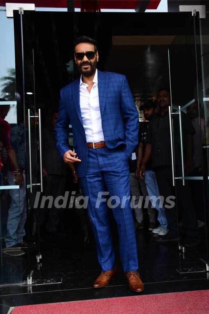 Ajay Devgn looked dapper in a striped blue blazer suit and white shirt