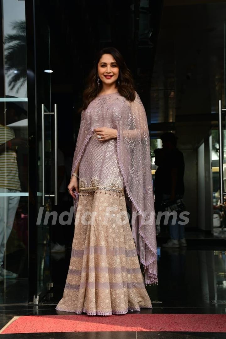 Madhuri Dixit looks graceful and elegant in an ethnic sharara set paired with a poncho