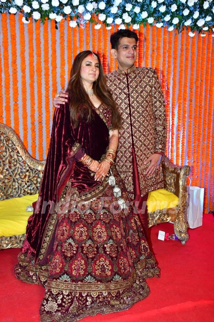 Rrahul Kanal poses with his wife 