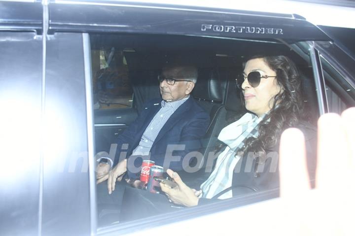 Juhi Chawla and her husband spotted at jaisalmer airport to attend Sid Kiara Wedding 