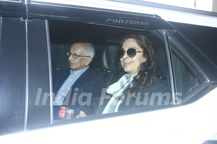 Juhi Chawla and her husband spotted at jaisalmer airport to attend Sid Kiara Wedding 