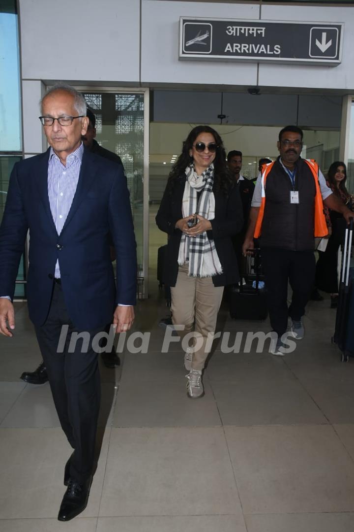 Juhi Chawla and her husband spotted at jaisalmer airport to attend Sid Kiara Wedding 