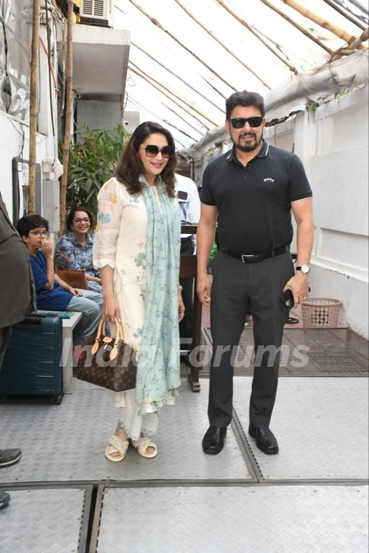 Madhuri Dixit snapped with her husband Dr. Shriram Nene in Bandra