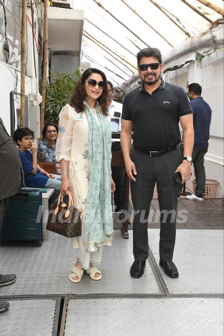 Madhuri Dixit snapped with her husband Dr. Shriram Nene in Bandra