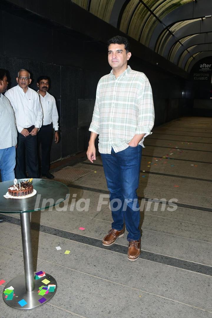 Siddharth Roy Kapur snapped cutting his birthday cake