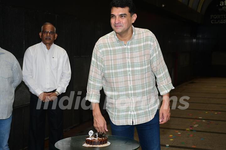 Siddharth Roy Kapur snapped cutting his birthday cake