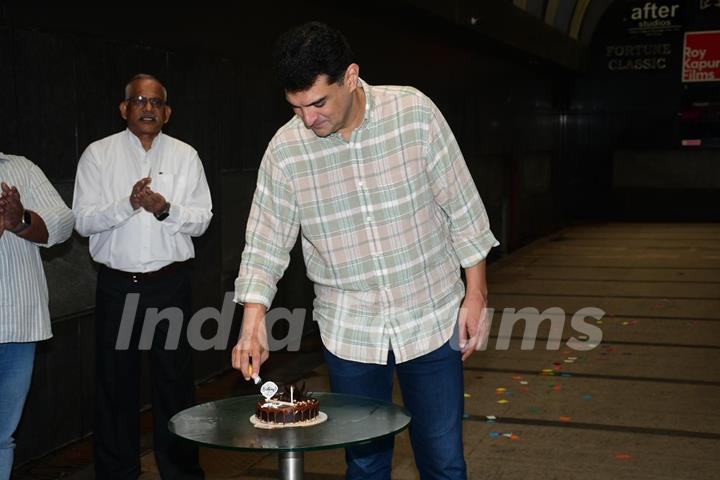 Siddharth Roy Kapur snapped cutting his birthday cake