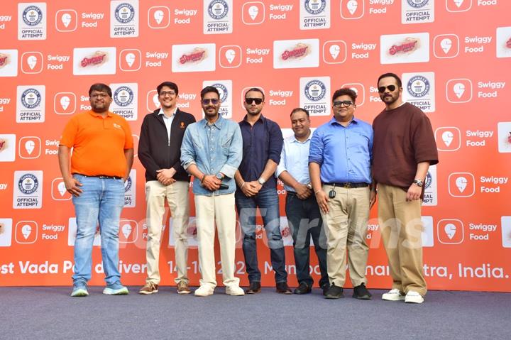 Ajay Devgn and Rohit Shetty attempt the Guinness World Record for the largest Vada Pav delivery at Airport High School & Junior College