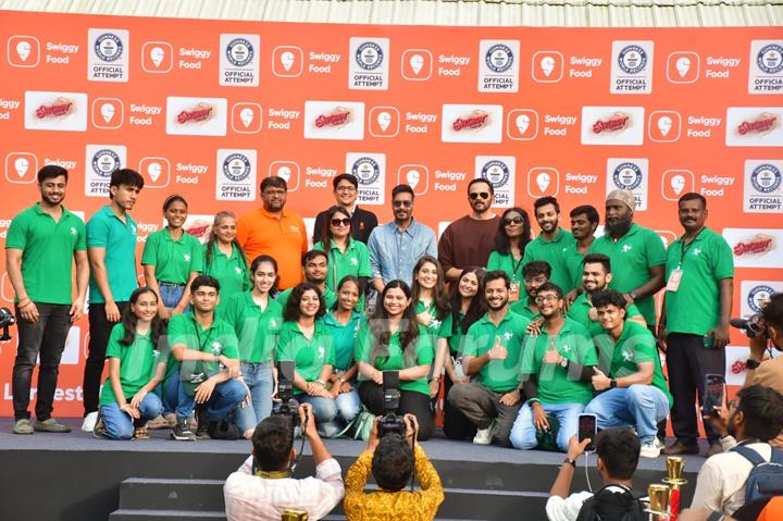 Ajay Devgn and Rohit Shetty attempt the Guinness World Record for the largest Vada Pav delivery at Airport High School & Junior College