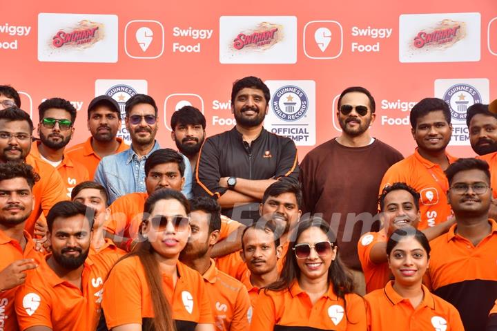 Ajay Devgn and Rohit Shetty attempt the Guinness World Record for the largest Vada Pav delivery at Airport High School & Junior College