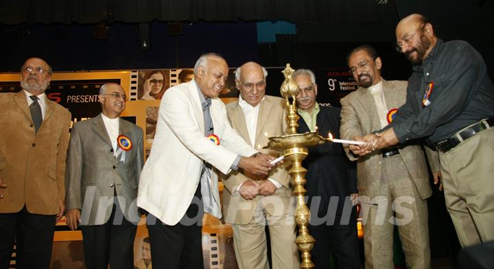 Celebrities lighting the lamp at the MAMI (Mumbai Academy of the Moving Image) film festival This year the festival will be dedicated to Hrishikesh Mukherjee In all, 125 films will be screened from 40 countries with special focus on South Africa