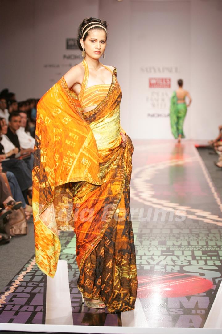 A model display the collection of Satya Paul at Lakme Fashion Week in Mumbai