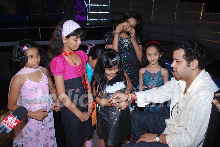 Raksha Bandhan on the sets of ''Chote Miya 2'' with Rahul Mahajan, in Mumbai