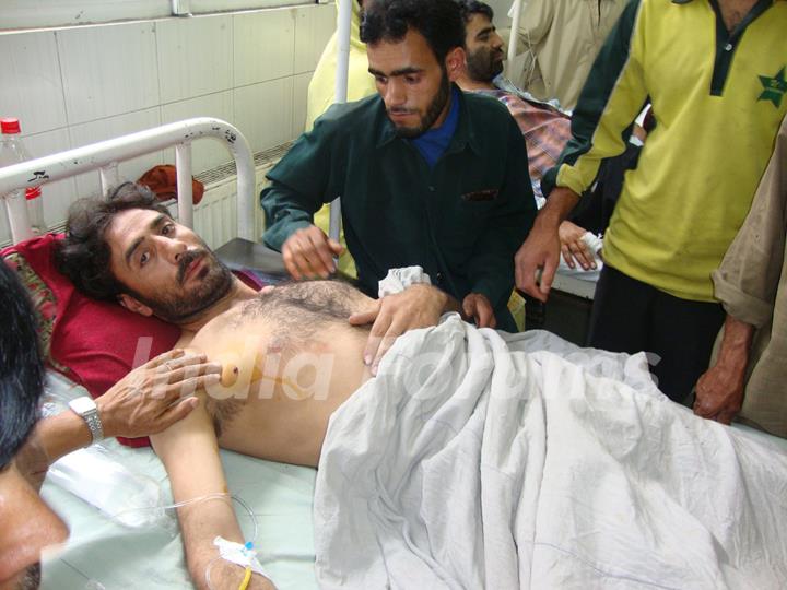 A person injured in the grenade attack in Srinagar Monday under treatment in hospital