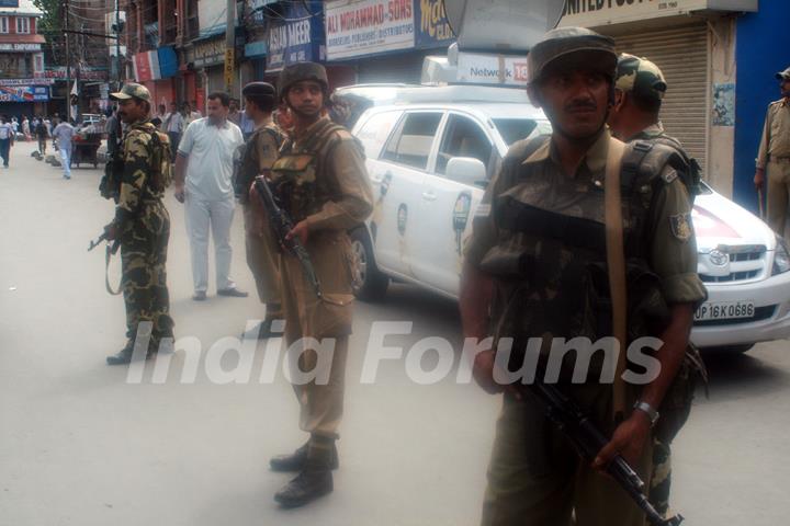 Security personnel standing guard at the shoout site