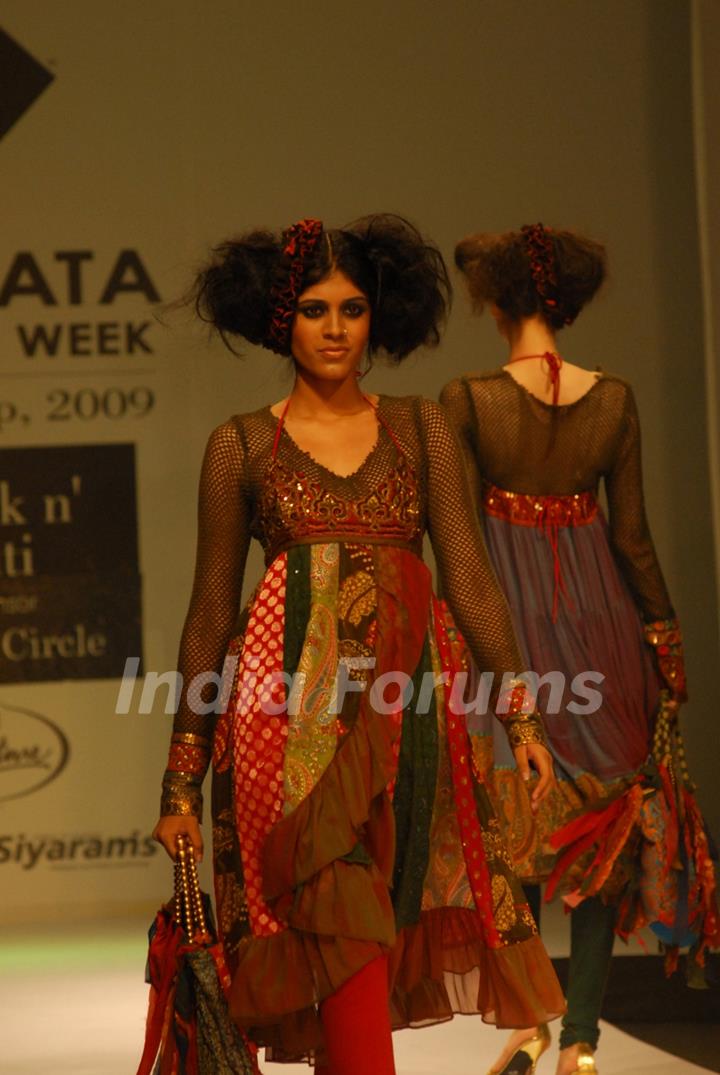 A model at the ramp display Satya Paul colloction during the Kolkata Fashion Week in Kolkata on 12th Sep 09