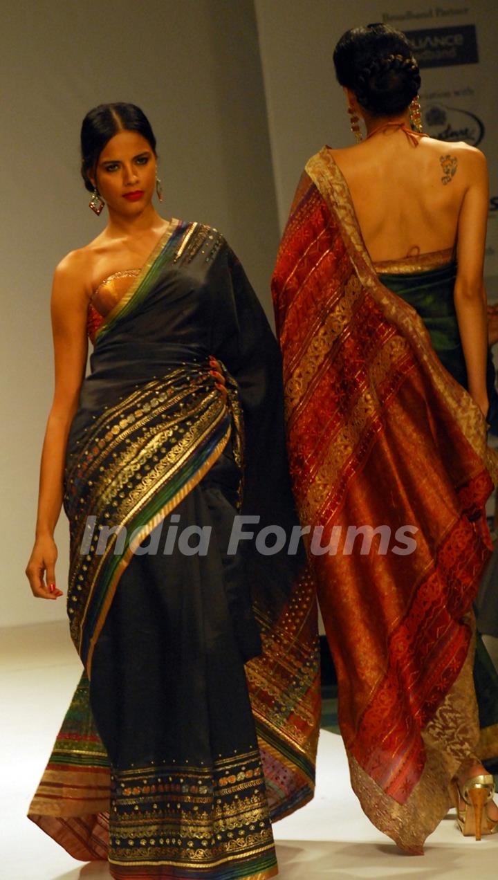 A model at the ramp display Satya Paul colloction during the Kolkata Fashion Week in Kolkata on 12th Sep 09